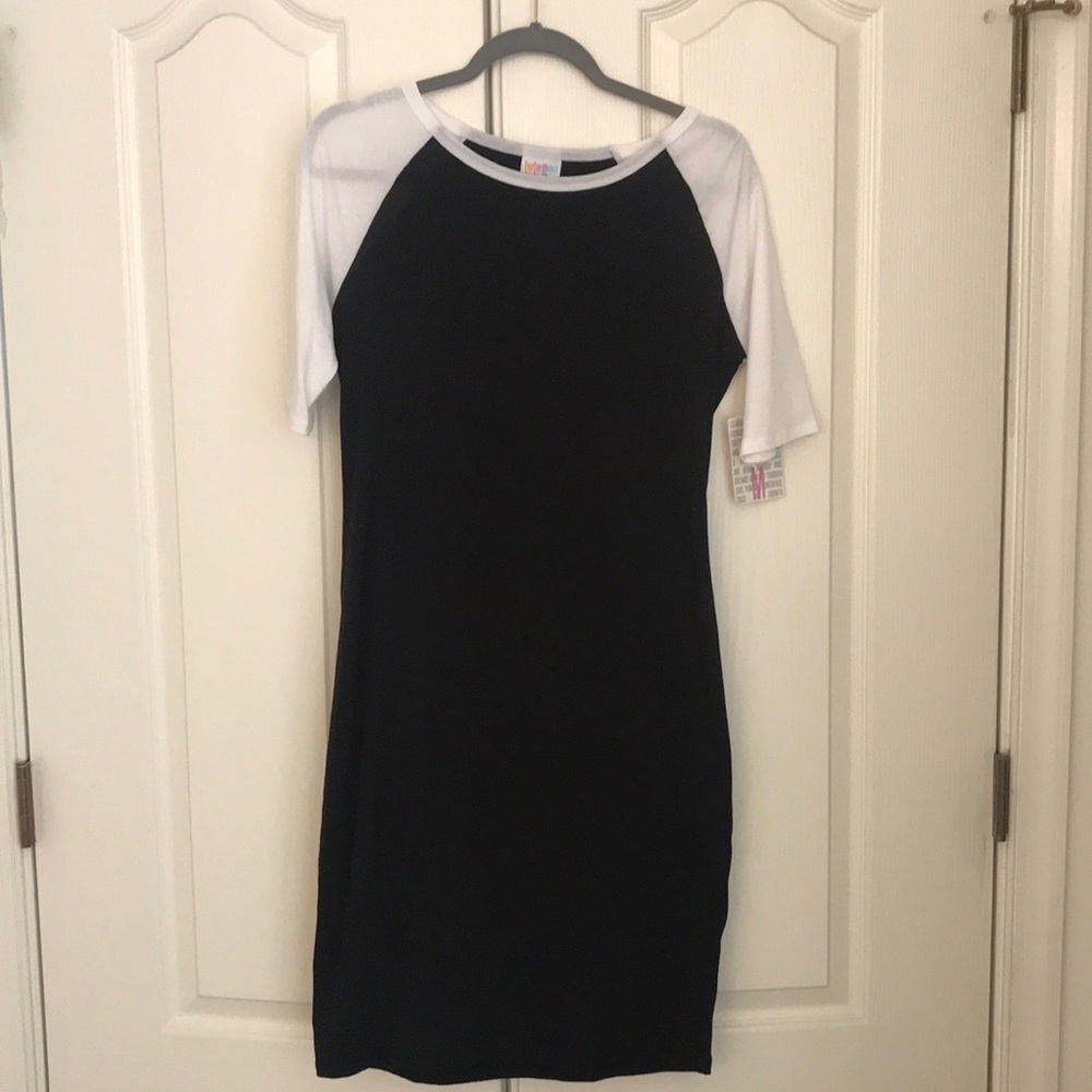 Solid black Lularoe Julia with White Sleeves